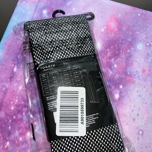 Torrid fishnet black tights size 1/2. NWT
